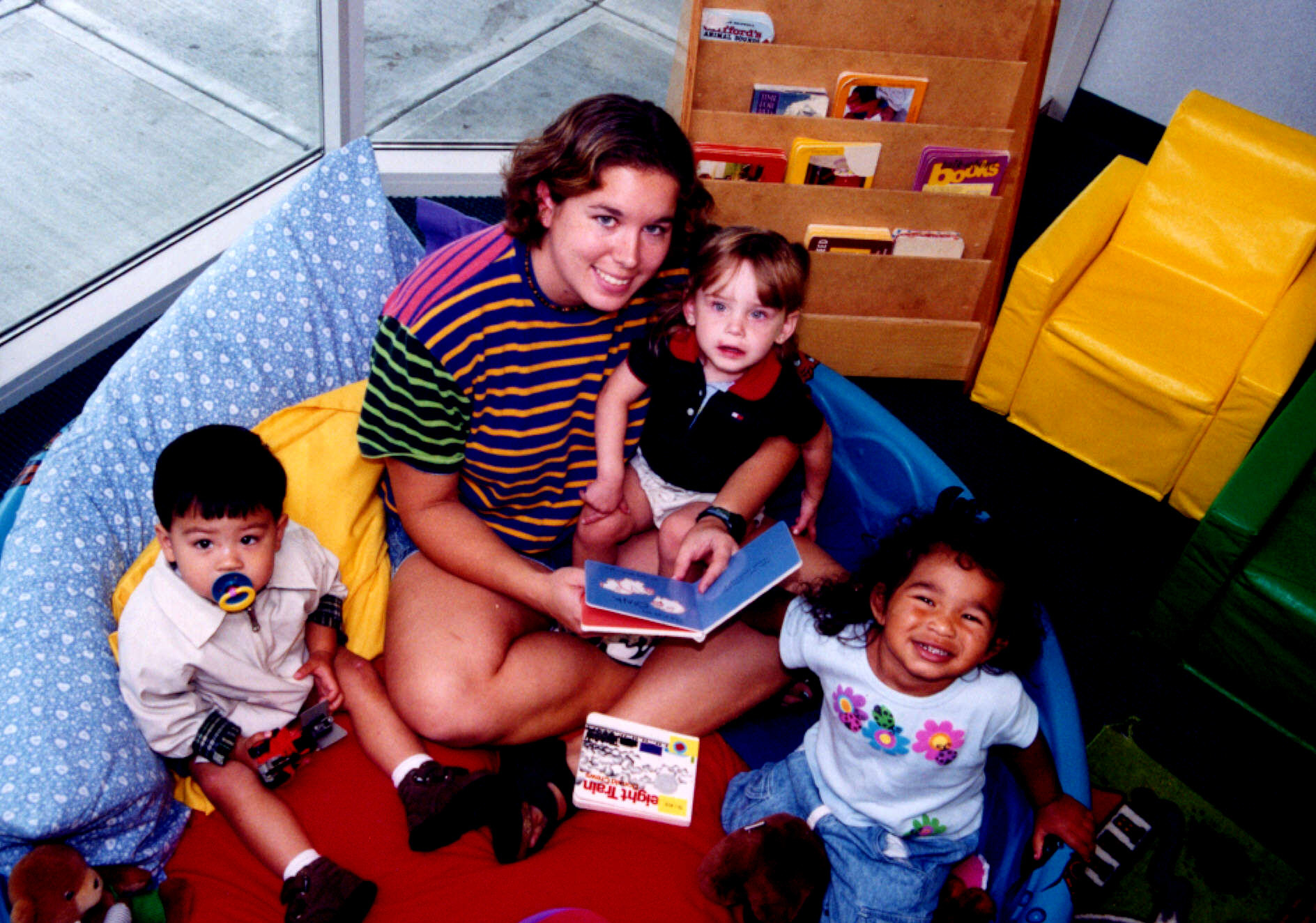 YMCA teacher reads book aloud to youth