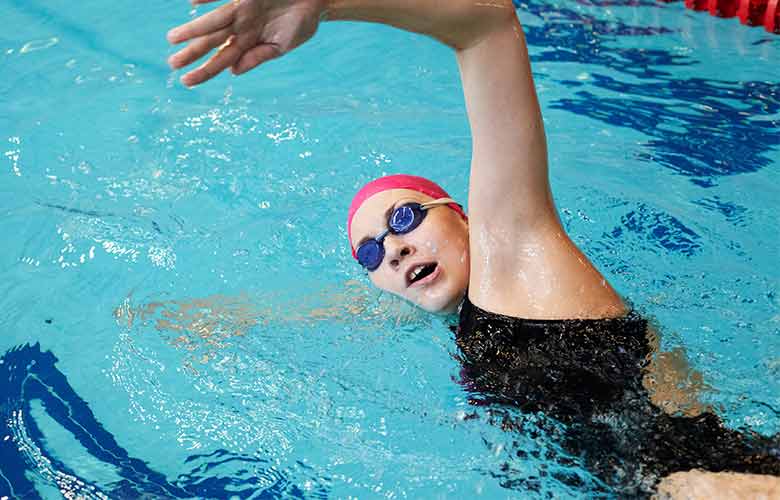 Youth girl swimming
