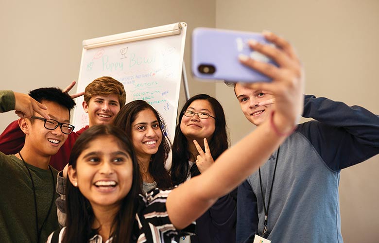 Teens taking a selfie