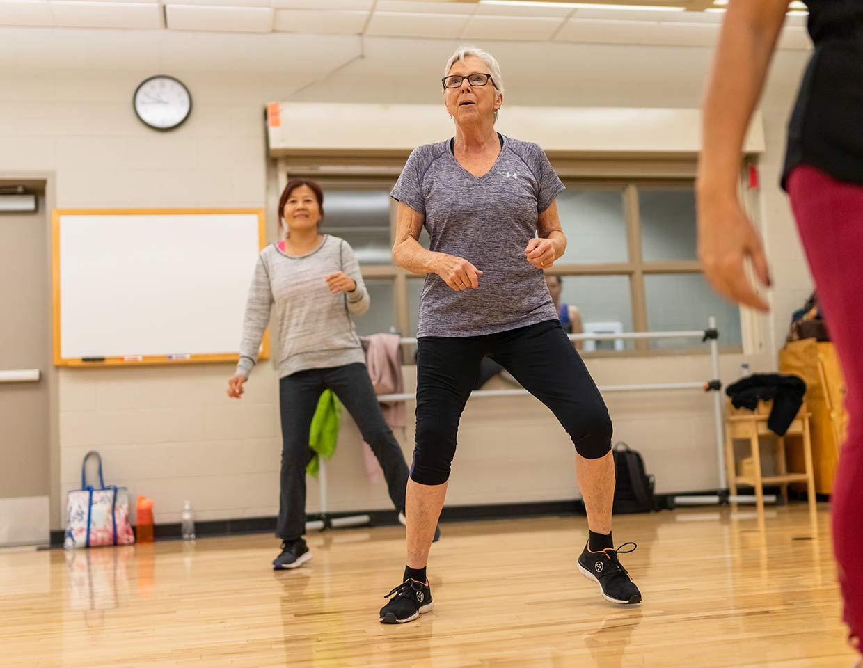 Woman in a dance fitness exercise class