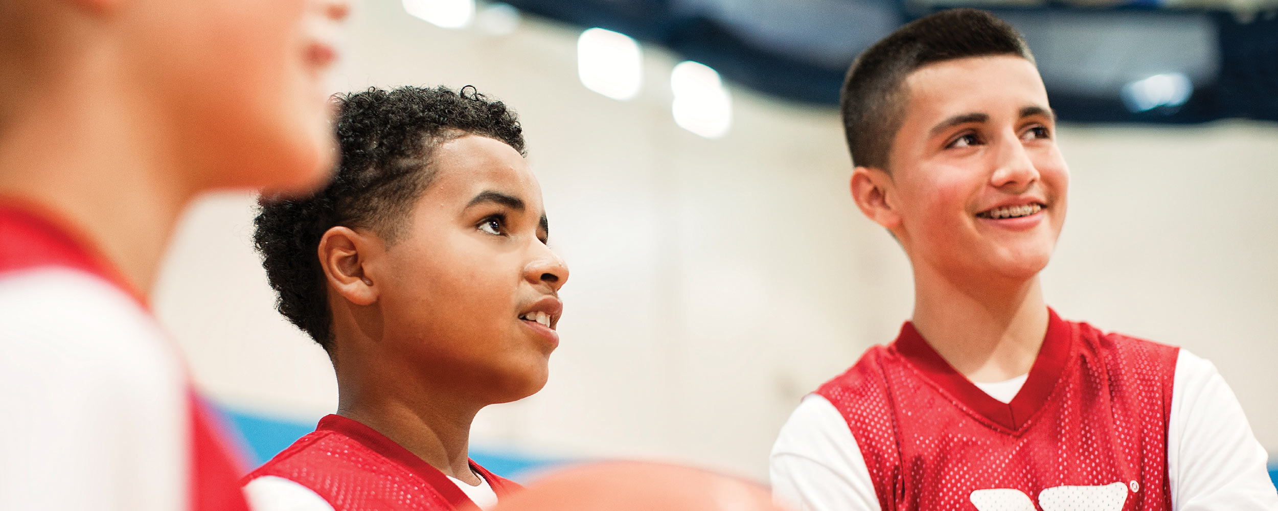 Young boys smiling at coach